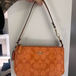 Coach orange 🍊 nolita